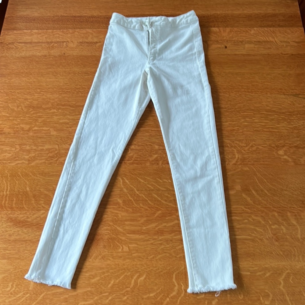 I am selling white jeans from Zara.